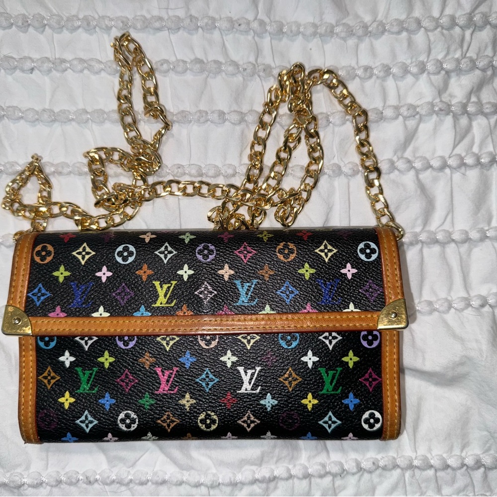 Sold Authentic Pre Loved Murakami Black Multicolored Wallet with chain insert.